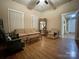 Living Room with hardwood floors, sofa, and two armchairs at 84 Walnut Ave, Gastonia, NC 28054