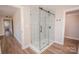 Modern bathroom with a large walk-in shower and updated fixtures at 7025 Nc Hwy 73 E Hwy, Mount Pleasant, NC 28124