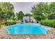 Spacious rectangular pool with concrete decking at 4428 Hounds Run Dr, Matthews, NC 28105