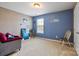 Bright bedroom with carpeted floors and plenty of natural light at 1814 Mill Creek Ln, Concord, NC 28025