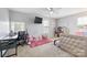 bedroom with a bed, desk, and playful decor at 1814 Mill Creek Ln, Concord, NC 28025