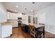 Kitchen with an island, white cabinets, and granite countertops at 1814 Mill Creek Ln, Concord, NC 28025