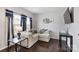 Living room with sectional sofa and hardwood floors at 1814 Mill Creek Ln, Concord, NC 28025