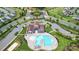 Aerial view of community pool, clubhouse, and playground at 1814 Mill Creek Ln, Concord, NC 28025