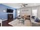 Spacious living room with sectional sofa and fireplace at 1814 Mill Creek Ln, Concord, NC 28025