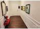 Bright entryway with wood flooring and decorative wall art at 343 Ox Bow Cir, Mount Holly, NC 28120