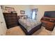 Cozy bedroom with a comfortable bed and a built-in desk at 343 Ox Bow Cir, Mount Holly, NC 28120