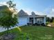Beautiful two-story house with a landscaped yard at 343 Ox Bow Cir, Mount Holly, NC 28120