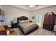 Spacious bedroom with plush bed, ample storage, and natural light at 343 Ox Bow Cir, Mount Holly, NC 28120