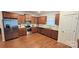 Modern kitchen with stainless steel appliances and wood cabinets at 343 Ox Bow Cir, Mount Holly, NC 28120