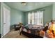 Light-filled bedroom featuring a full-size bed and ample natural light at 5051 Meanna Dr, Clover, SC 29710