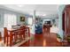 Open dining area with a view into the living room and kitchen at 5051 Meanna Dr, Clover, SC 29710