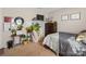 Well-lit bedroom, includes a double bed and dresser at 5051 Meanna Dr, Clover, SC 29710