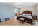 Main bedroom with a king-size bed and en-suite bathroom access at 5051 Meanna Dr, Clover, SC 29710