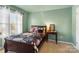 Bright bedroom with a double bed, window, and nightstand at 5051 Meanna Dr, Clover, SC 29710