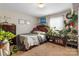 Cozy bedroom featuring a double bed and plenty of plants at 5051 Meanna Dr, Clover, SC 29710