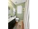 Simple bathroom with single vanity and wood-look floors at 330 Crocker Rd, Kings Mountain, NC 28086