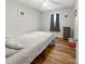 Bright bedroom with double bed, dresser, and wood-look floors at 330 Crocker Rd, Kings Mountain, NC 28086