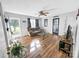 Bright living room with hardwood floors, comfy couch, and access to backyard at 330 Crocker Rd, Kings Mountain, NC 28086