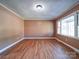 Living room with hardwood floors and view of kitchen at 624 Newcastle Rd, Gastonia, NC 28052