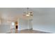 Open living room with hardwood floors and views into the kitchen at 1205 Danielle Downs Ct, Concord, NC 28025