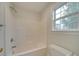 Bathroom with tub, shower, and window at 1205 Danielle Downs Ct, Concord, NC 28025