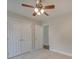 Spacious bedroom with ceiling fan and access to another room at 1205 Danielle Downs Ct, Concord, NC 28025