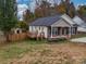 Ranch home with deck, shed, and fenced backyard at 1205 Danielle Downs Ct, Concord, NC 28025