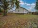 Backyard of the house with wooden fence at 1205 Danielle Downs Ct, Concord, NC 28025