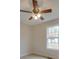 Bright bedroom with ceiling fan, carpet, and large window at 1205 Danielle Downs Ct, Concord, NC 28025