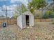 Small wooden storage shed in backyard at 1205 Danielle Downs Ct, Concord, NC 28025