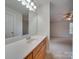Bathroom with vanity, mirror and access to bedroom at 1205 Danielle Downs Ct, Concord, NC 28025
