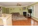 Spacious living room with corner fireplace and hardwood floors at 3015 Sweetspire Rd, Charlotte, NC 28215