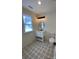 Modern bathroom with white vanity, patterned tile floor, and black fixtures at 409 19Th Ave Nw Cir # 12, Hickory, NC 28601