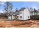 Two-story home with gray and white siding, a two-car garage, and a concrete driveway at 4126 Old Monroe Marshville Rd, Wingate, NC 28174