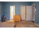 Bright bedroom with access to other rooms and closets at 394 Link Dr, Iron Station, NC 28080