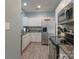 Modern kitchen with stainless steel appliances and granite countertops at 18525 Mizzenmast Ave, Cornelius, NC 28031