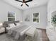 Virtually staged bedroom with a cozy atmosphere and ample natural light at 103 Pleasant Hill St, Lancaster, SC 29720