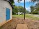 Small backyard with shed and view of residential street at 103 Pleasant Hill St, Lancaster, SC 29720