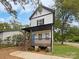 Charming two-story house with a front porch and landscaping at 103 Pleasant Hill St, Lancaster, SC 29720