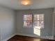 Well-lit bedroom with two windows and wood-look floors at 3739 Innes Ln, Maiden, NC 28650