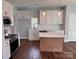 Modern kitchen featuring white cabinets, stainless steel appliances, and an island at 3739 Innes Ln, Maiden, NC 28650