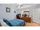 Bedroom with double bed, dresser, and ceiling fan at 900 Alma Ave, Kannapolis, NC 28081