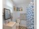 Small bathroom with single sink vanity and shower/tub combo at 900 Alma Ave, Kannapolis, NC 28081