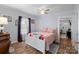 Bedroom with double bed and access to hallway at 900 Alma Ave, Kannapolis, NC 28081
