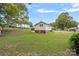 View of backyard, neighboring houses, and grassy area at 900 Alma Ave, Kannapolis, NC 28081