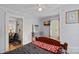 Bedroom with double bed, dresser and access to hallway at 900 Alma Ave, Kannapolis, NC 28081
