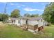Home's side view showcasing a deck and additional yard space at 900 Alma Ave, Kannapolis, NC 28081