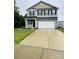 Two-story house with gray siding and a two-car garage at 229 Lake George Dr, Shelby, NC 28152