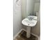 Simple bathroom with pedestal sink and mirror at 229 Lake George Dr, Shelby, NC 28152